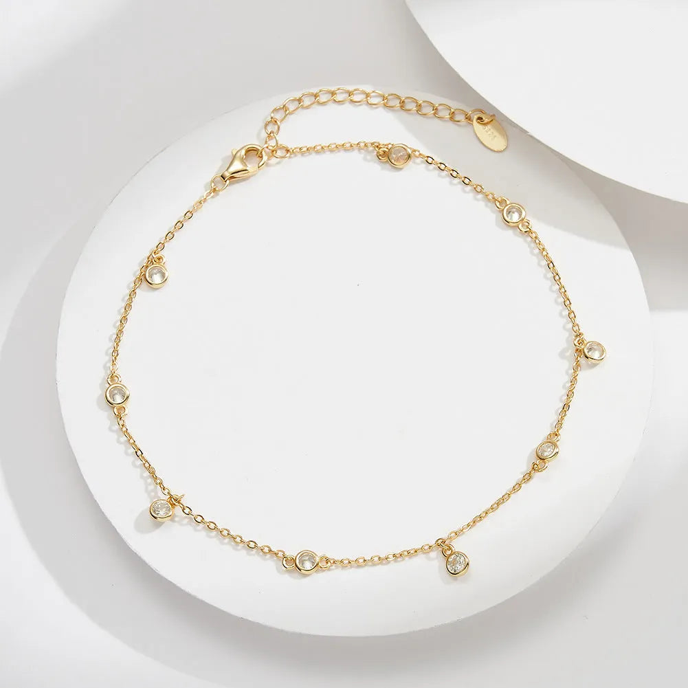 Women's sterling silver anklet with geometric zirconium pendant in gold colour