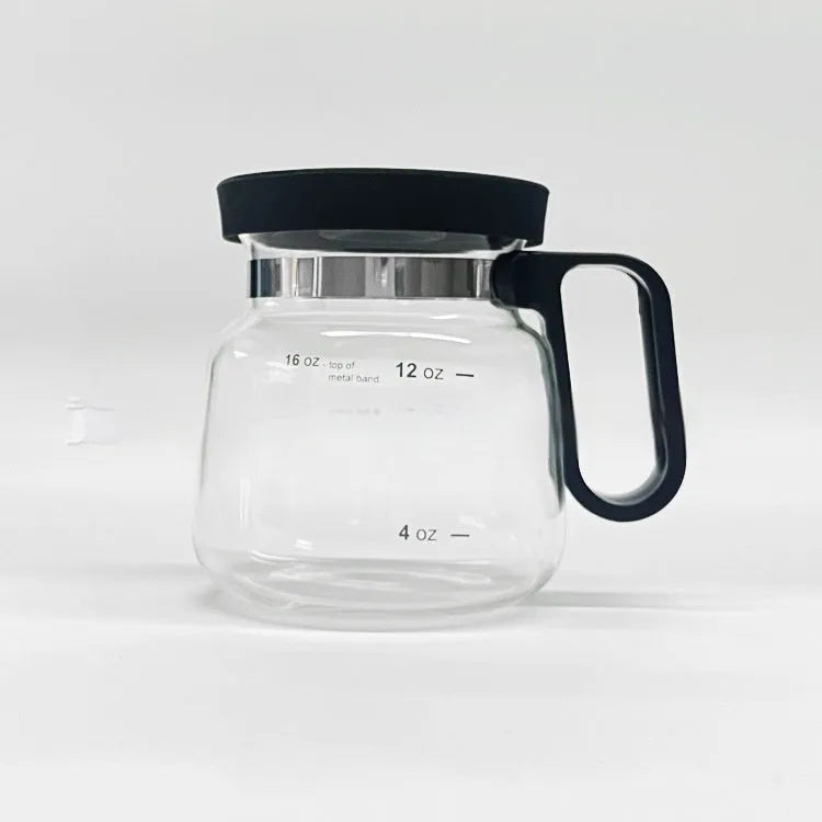 Transparent borosilicate glass coffee maker with a black silicone cover on its neck.