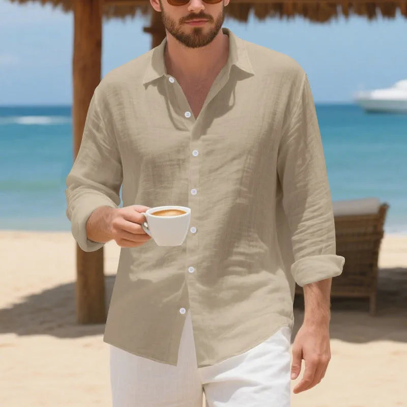 Man wearing a loose-fit linen casual shirt in a light blue colour, showing the non-iron style.