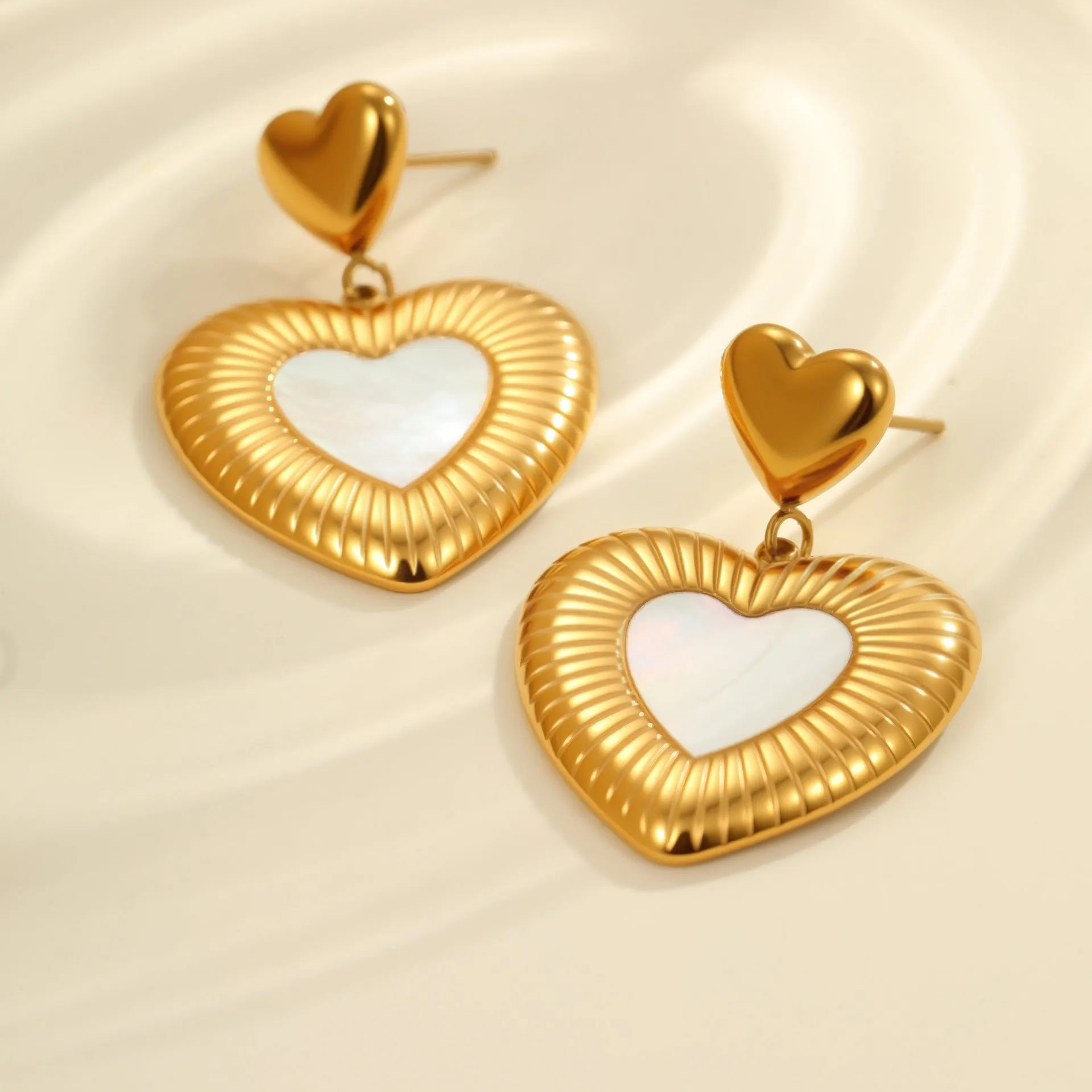 Women's gold heart-shaped fritillary earrings with stainless steel construction and electroplated finish
