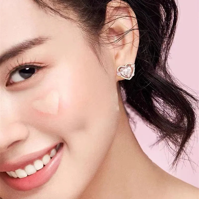Guardian Heart Stud Earrings with white gold-coloured electroplated finish and heart shape design