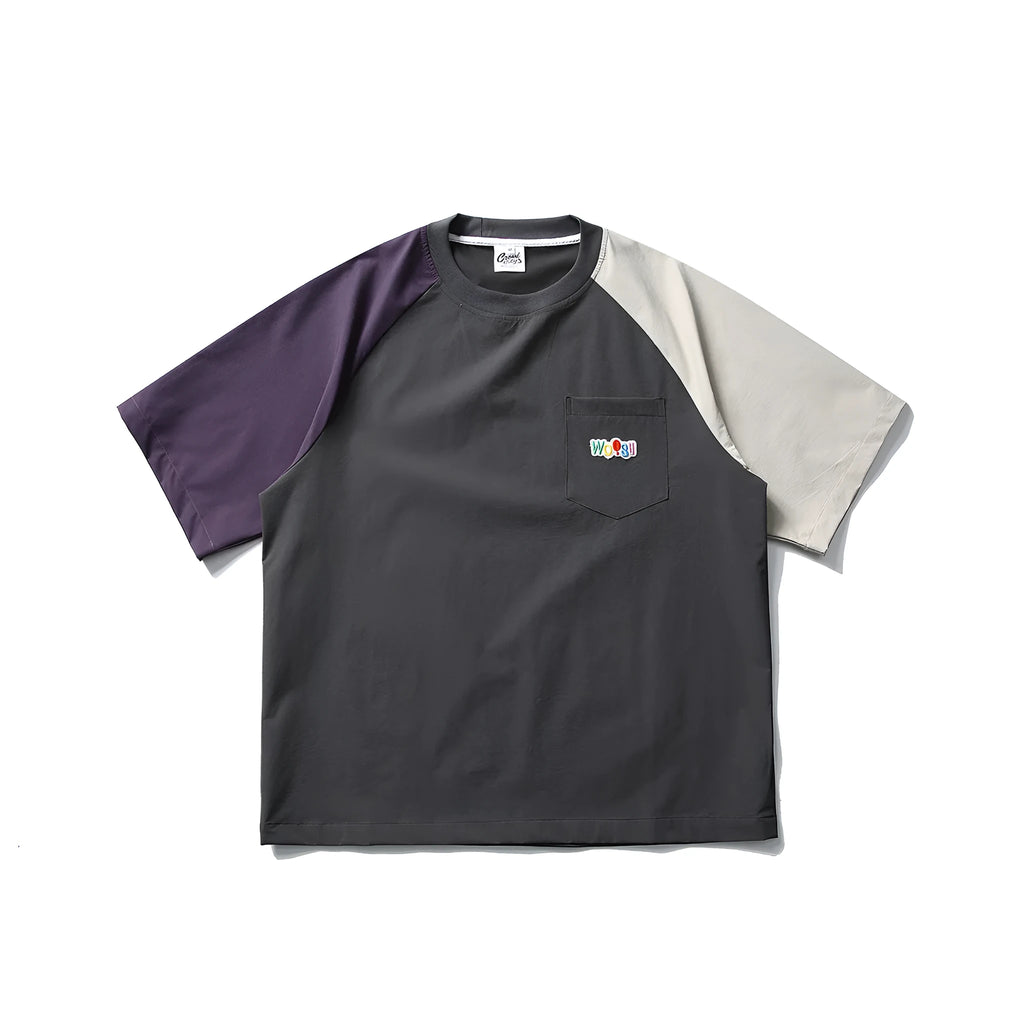 Dark grey men's loose fit t-shirt with contrast raglan sleeves on a neutral background