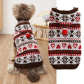 Blue knitted dog sweater with snowflake, love heart, and striped camouflage pattern on a small dog.