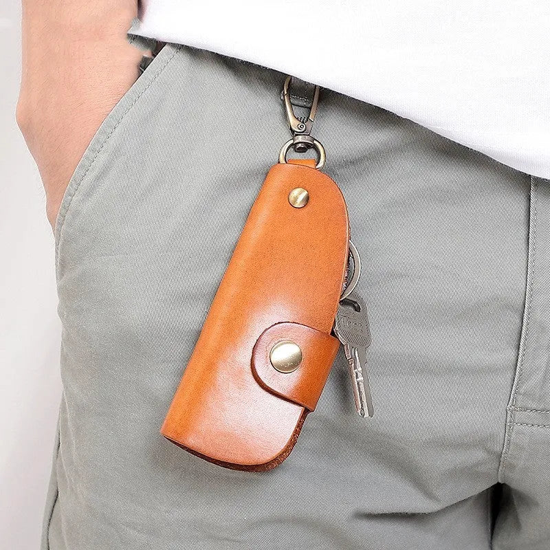 Genuine leather handmade short car key case in black, brown, coffee, and purplish red.
