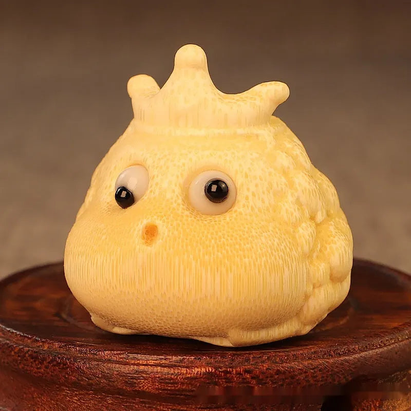 Solid bamboo carving of a cute Crown Princess toad hand ornament