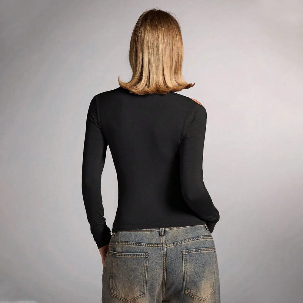 Black women's halter neck slim fit top with long sleeves on a mannequin.