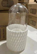 White rotating transparent acrylic makeup brush holder with dustproof lid on desktop