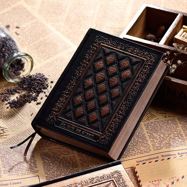 A5 notepad with textured embossed faux leather cover in bronze or black gold colour.