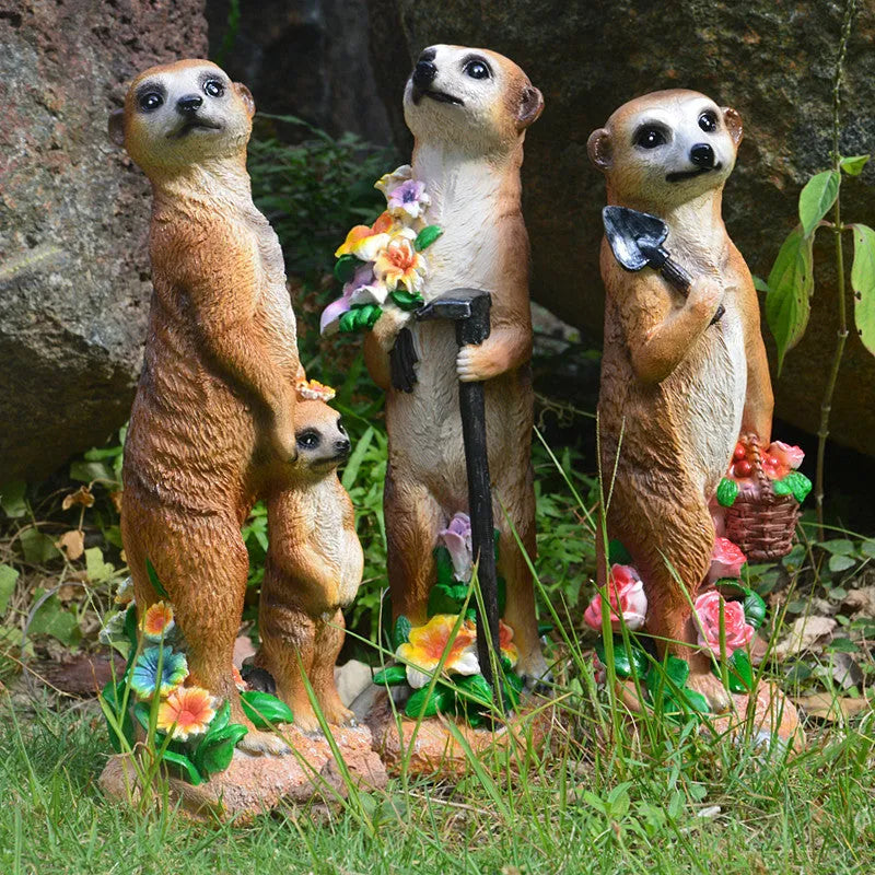 Straw hat mongoose garden ornament figurine in resin plastic.