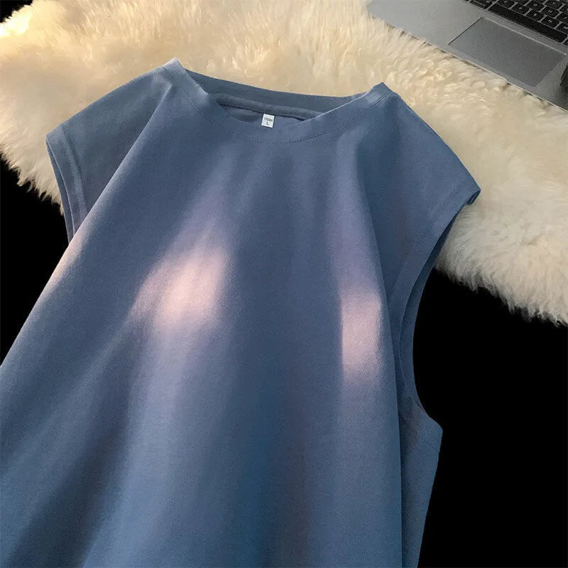 Men's loose fit solid colour cotton tank top shown in apricot, available in sizes up to 5XL.