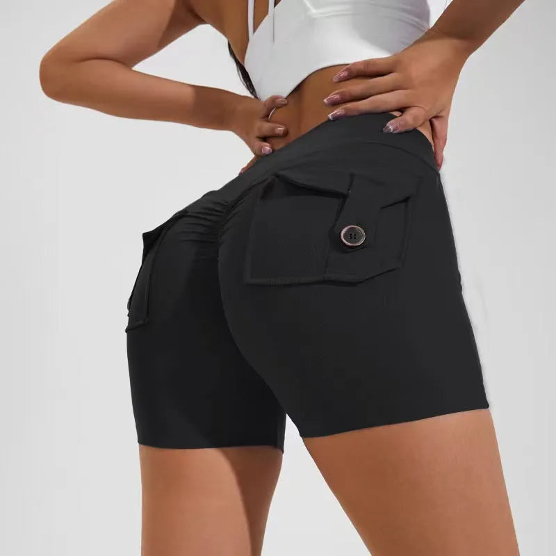 Women's high-waist fitness shorts with pockets in quick-dry nylon fabric, shown in Electric Blue colour