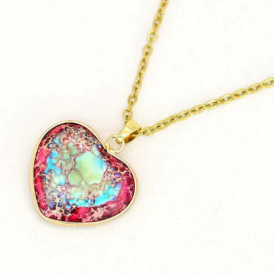Red and blue heart-shaped emperor stone pendant necklace on a metal chain