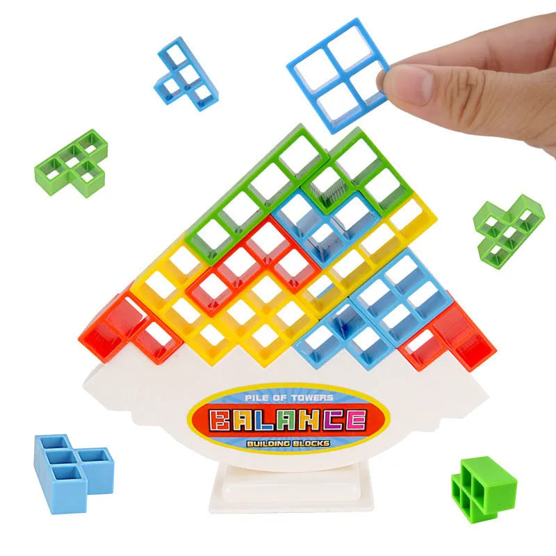 Plastic balance stacking game with 16 coloured building blocks on a chassis