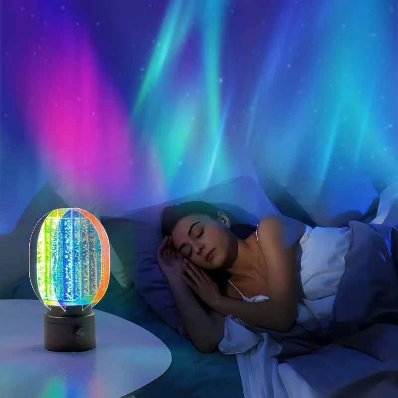 Creative small night lamp with rotating head and dimmable light on a table