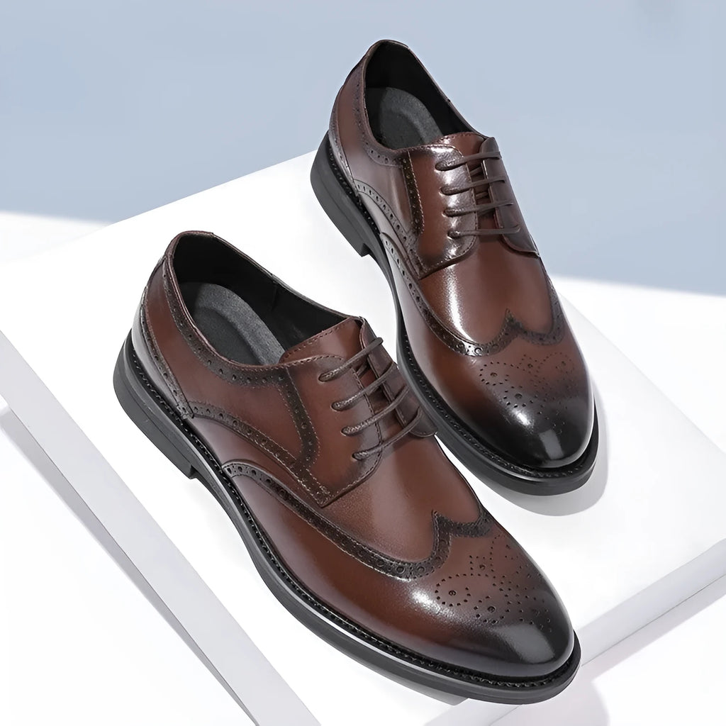 Men's black and brown brogue business shoes with classic detailing, shown from the side.