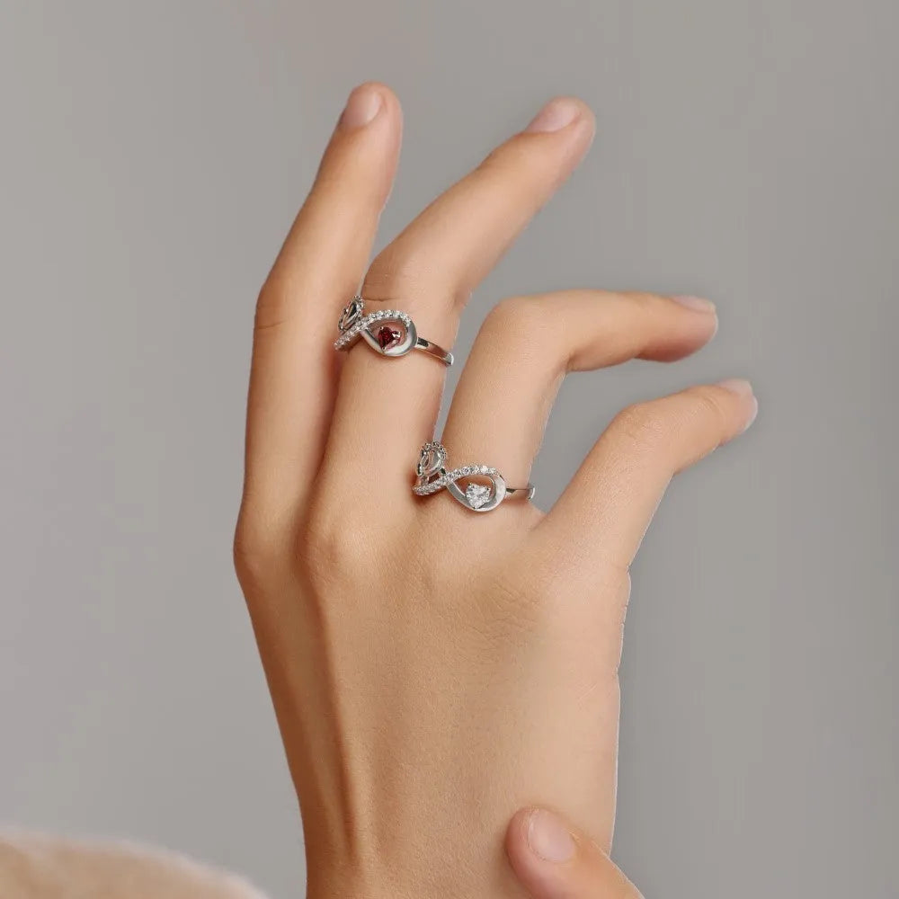 Silver geometric ring with rose red electroplated finish featuring new baby footprints design