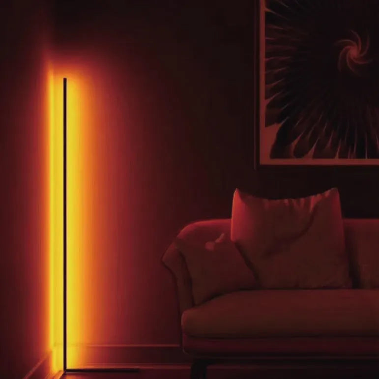Black smart floor lamp with aluminium body and silicone shade, featuring remote-controlled RGB lighting