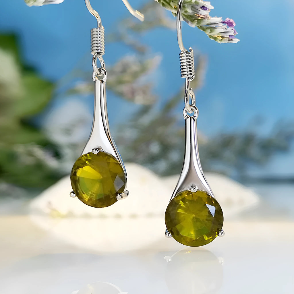 Olive green topaz drop-shaped earrings with retro design on alloy with electroplated finish