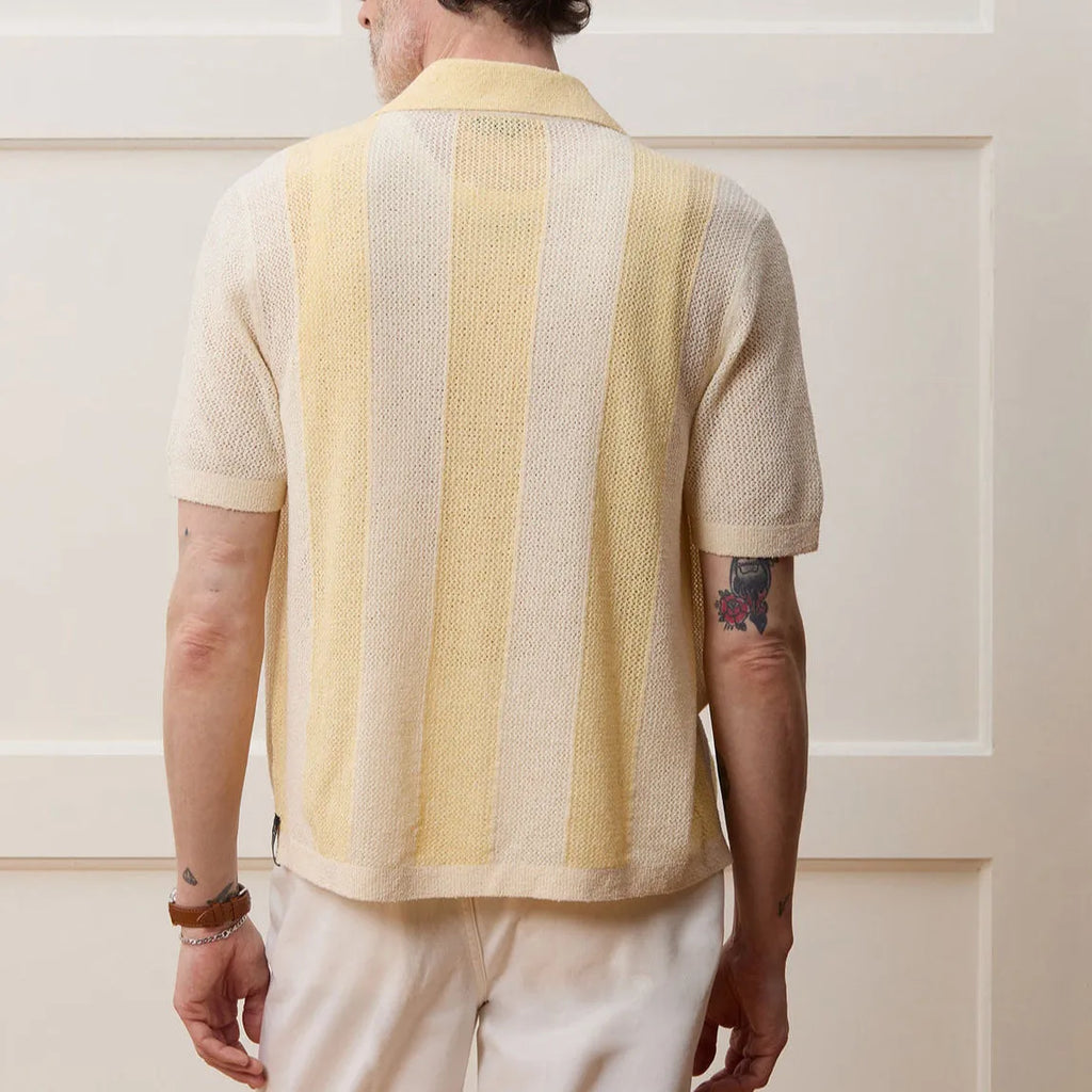 Yellow tencel polo shirt with asymmetric hollow-out design and short sleeves for summer casual wear