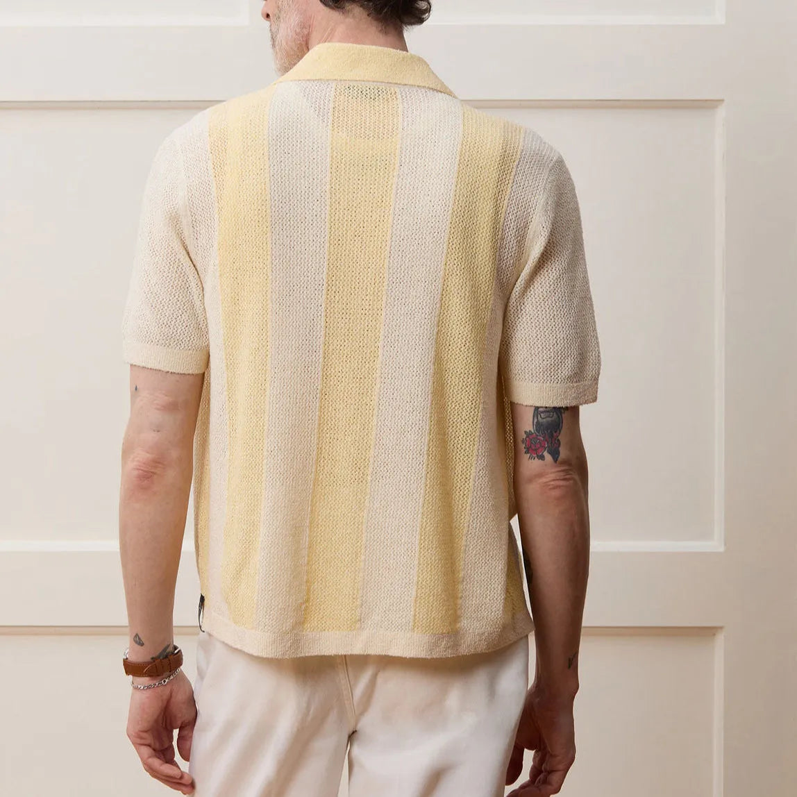 Yellow tencel polo shirt with asymmetric hollow-out design and short sleeves for summer casual wear