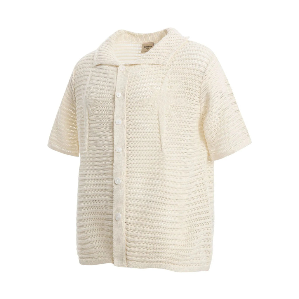 Men's apricot and black loose-fit retro cotton short sleeve casual shirt on hanger.