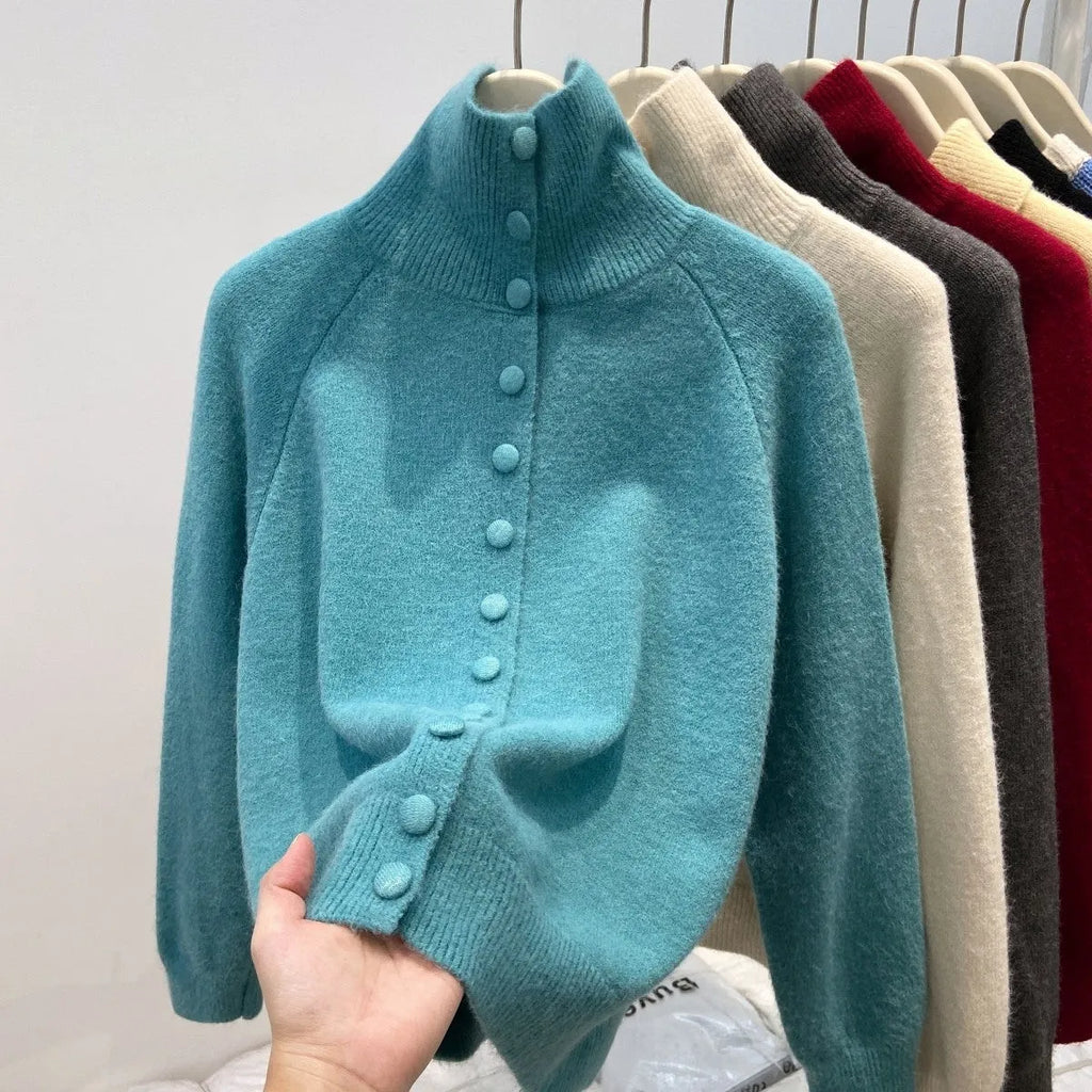 Women's loose fit turtleneck cardigan in thick polyester knit, button front, available in six colours including red and blue
