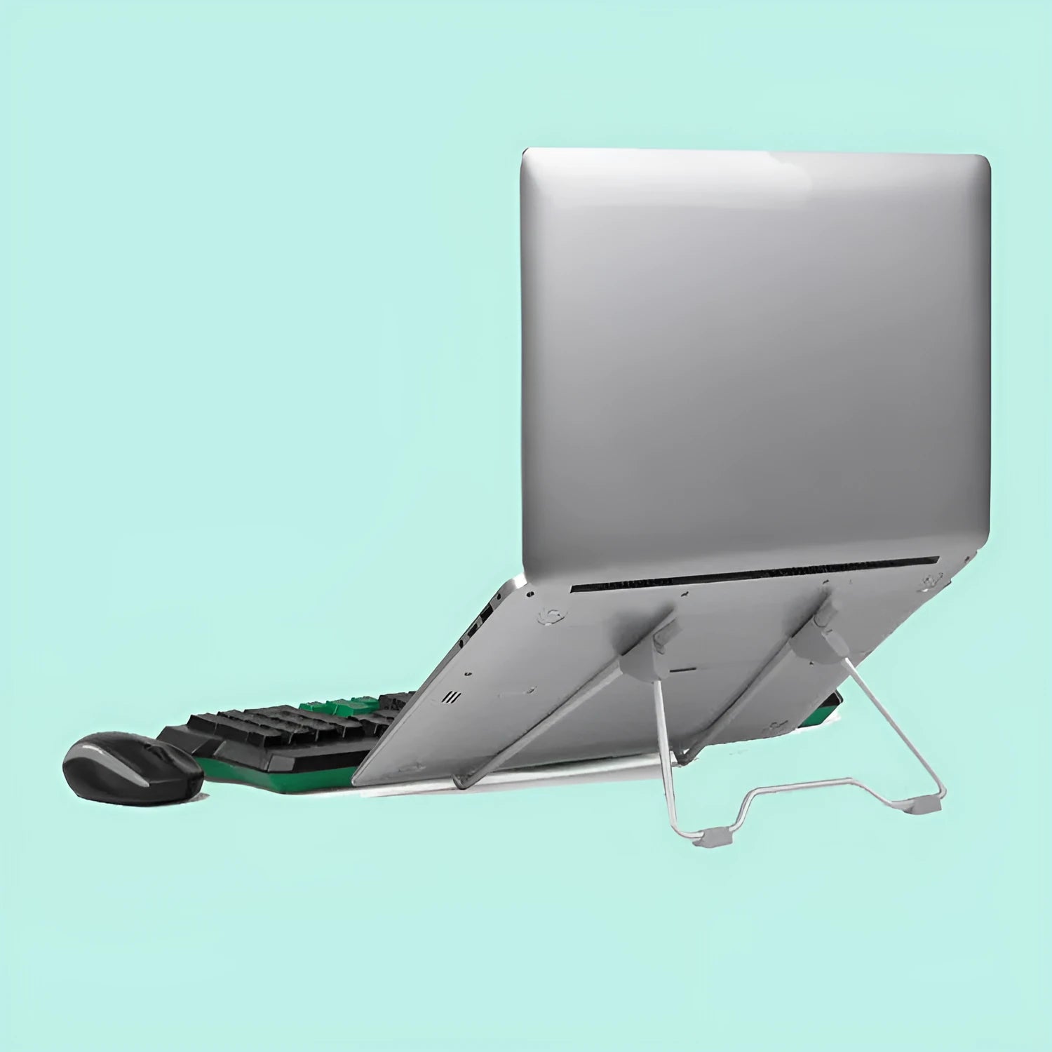 Grey aluminium alloy and plastic desktop stand holding a mobile phone and a laptop.