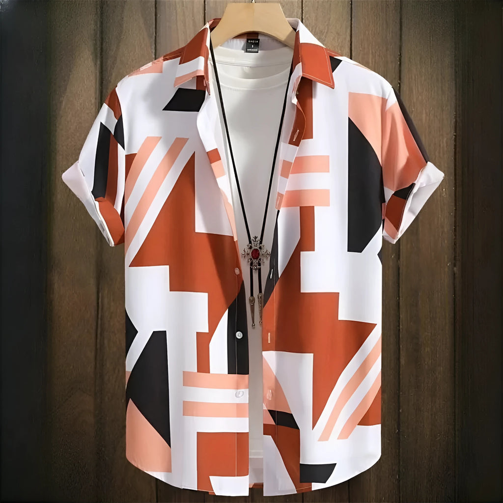 Man wearing a loose-fit short sleeve camouflage print cardigan shirt.