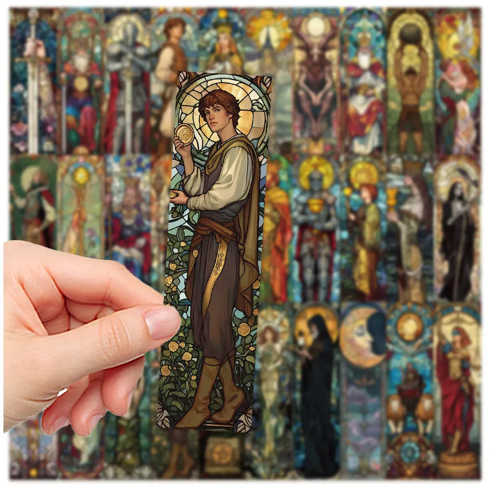 Set of 30 painted glass tarot themed cute style paper bookmarks laid out on a surface