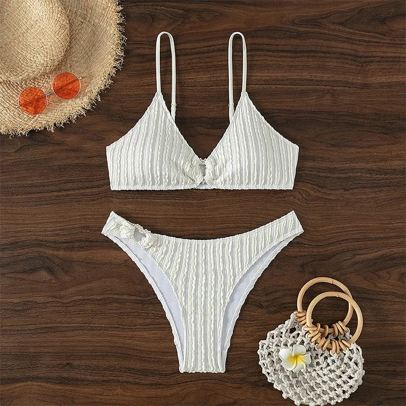 White women's V-neck swimsuit with separate top and shorts for beach or pool