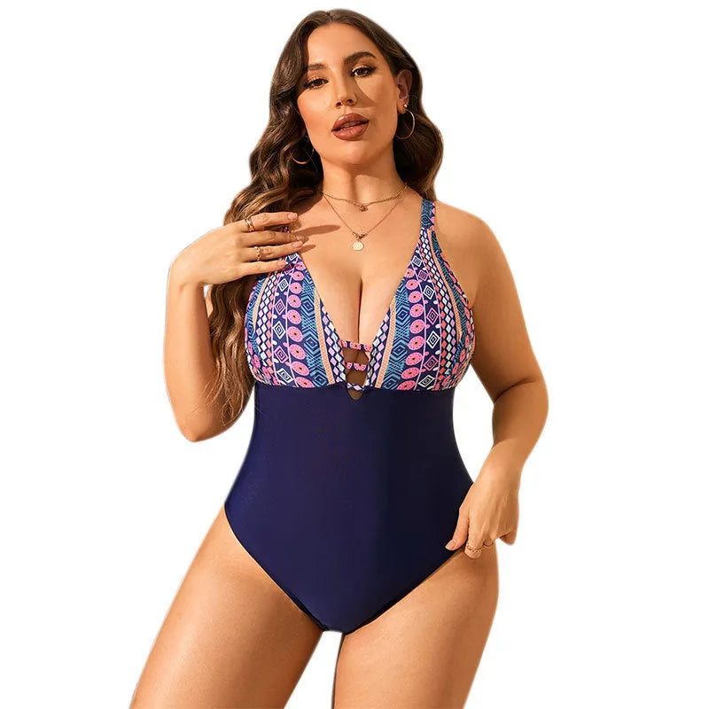 Leopard print plus size one-piece swimsuit with V-neck and conservative belly coverage on a mannequin.