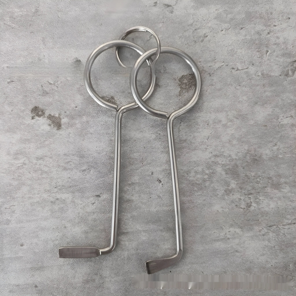 Two alloy metal wrench tools from a portable universal set for DIY and repairs.