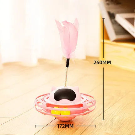Pink cat stick toy with self-righting tumbler turntable measuring 17cm by 10cm
