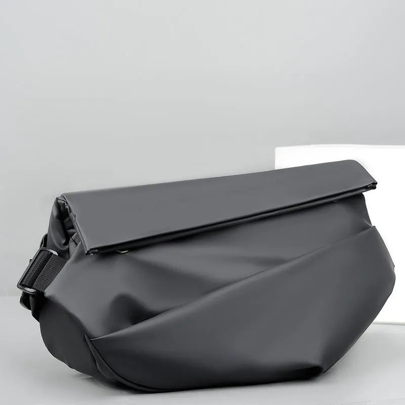 Grey PU crossbody bag showing shoulder strap and internal phone compartment