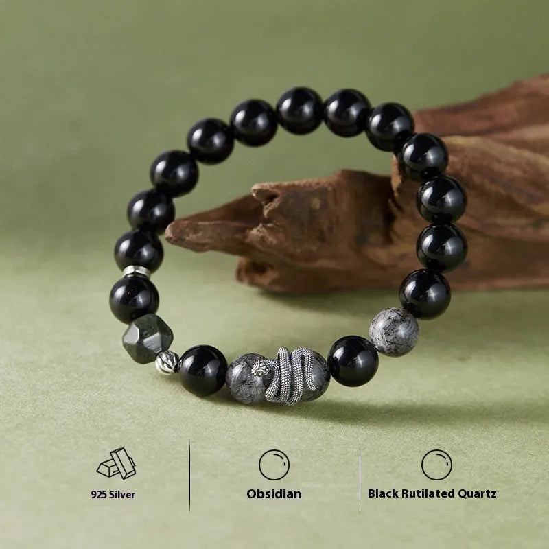 Men's black obsidian and sterling silver snake bracelet with retro Zodiac design