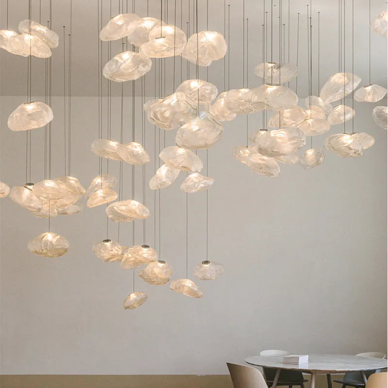 Modern glass decorative chandelier with LED lighting in leisure setting