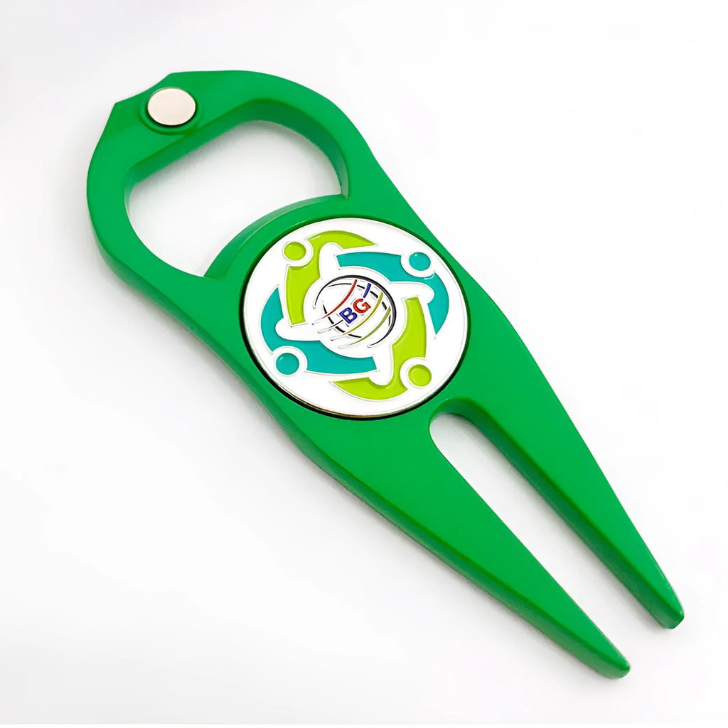 Black zinc alloy golf ball yoke and bottle opener tool with 25mm coin on putting green