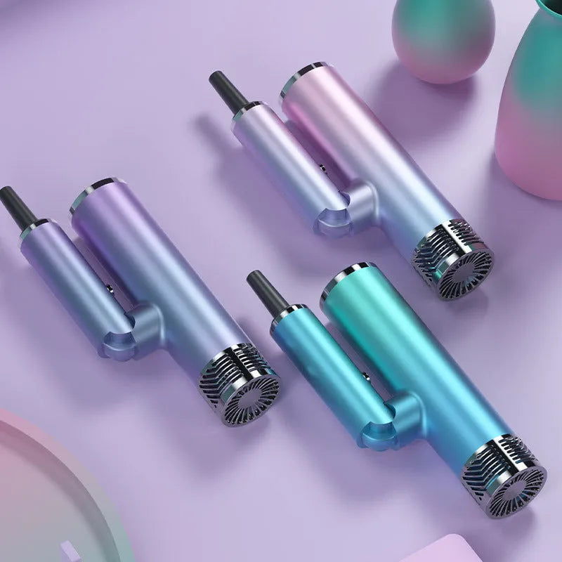Green and purple foldable portable hair dryer with compact travel design.