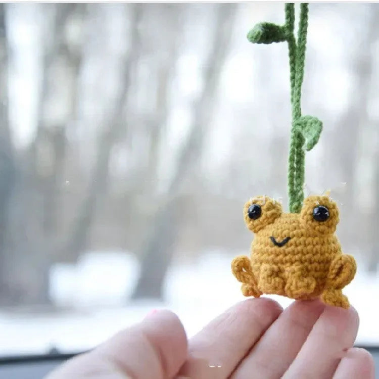 Green handmade woven plush frog car pendant hanging, showing 15cm length and cartoon style.