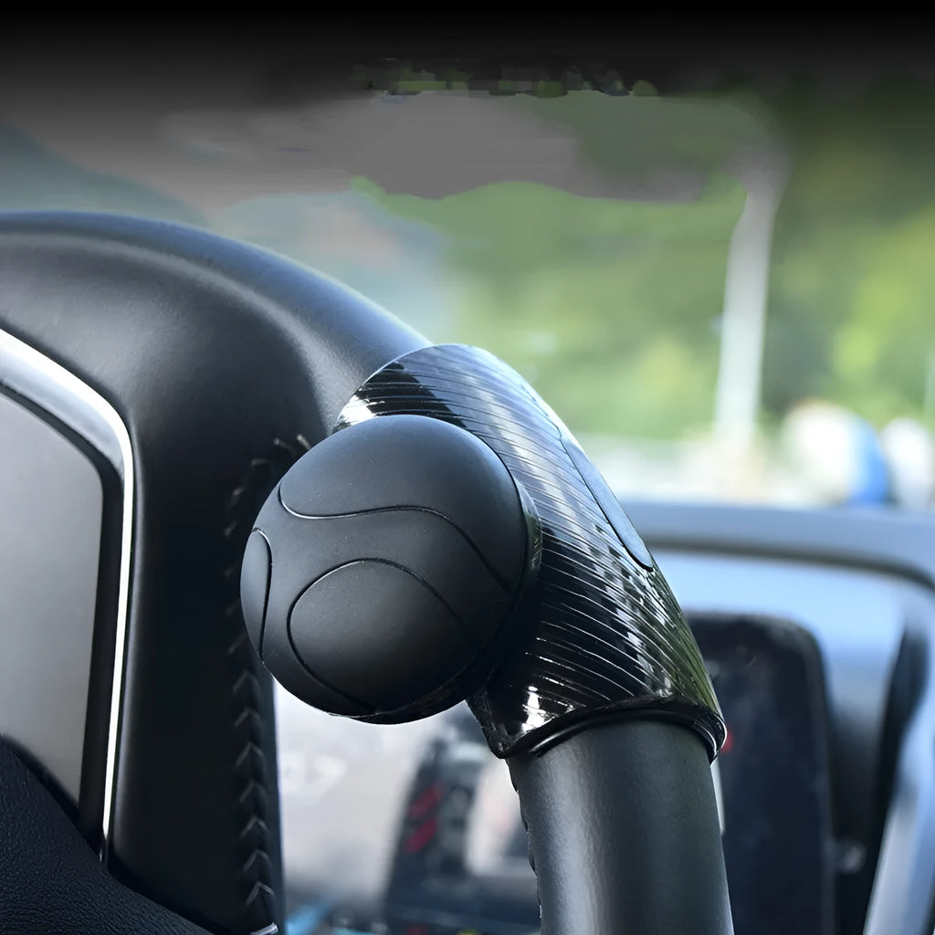Steering wheel assist ball with silicone grip showing black and blue colour options