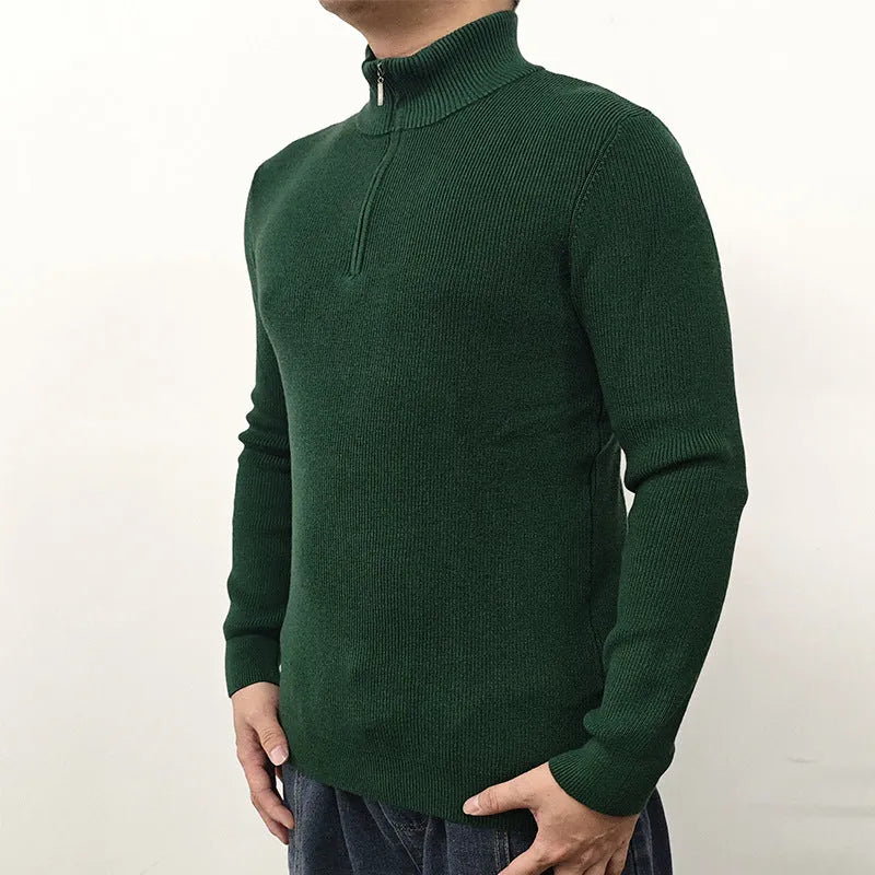 Men's grey half-turtleneck zip front sweater with long sleeves on a hanger.