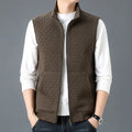Men's casual sleeveless vest waistcoat in a neutral colour on a hanger.