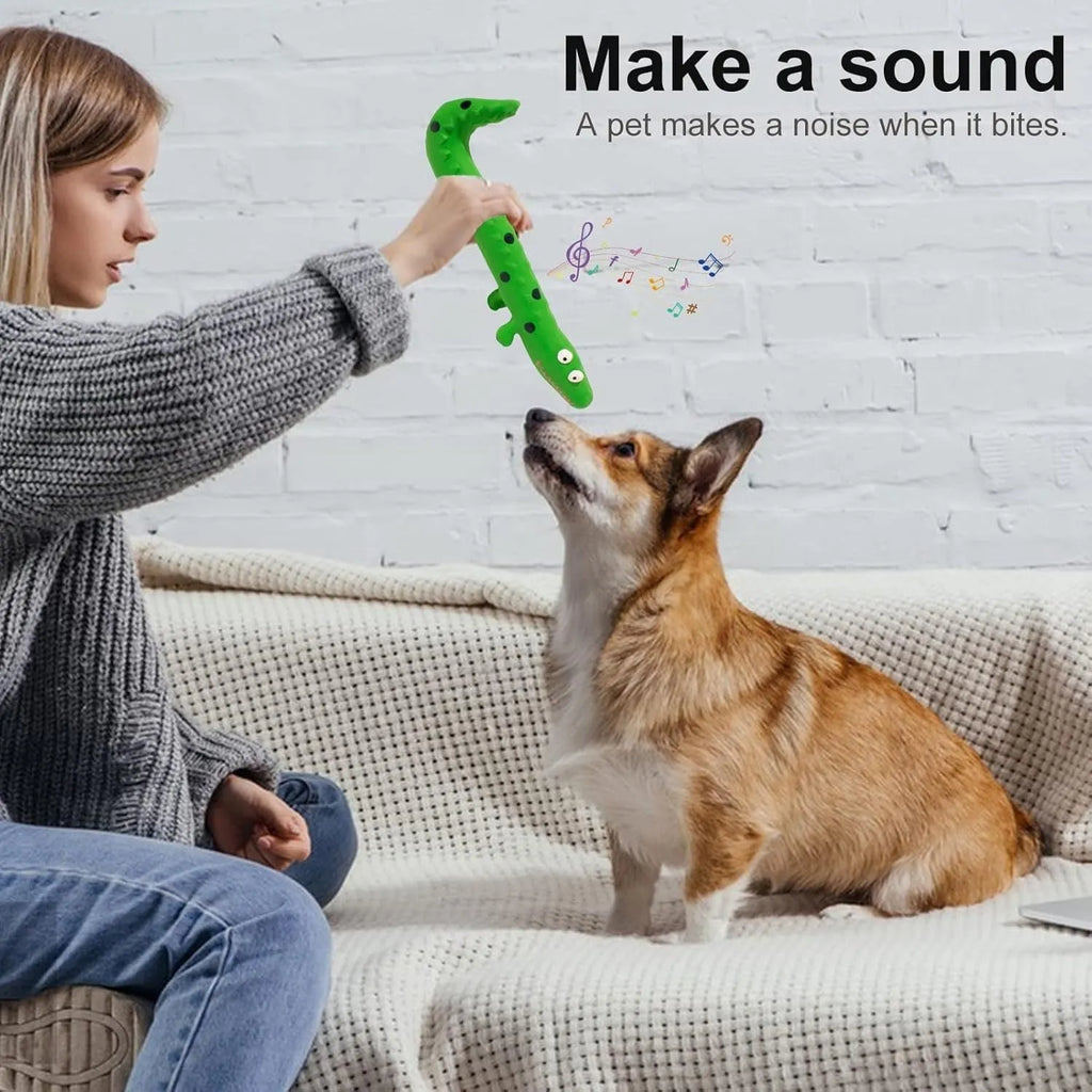 Green lizard-shaped dog chew toy with textured surface and squeaker for aggressive chewing dogs