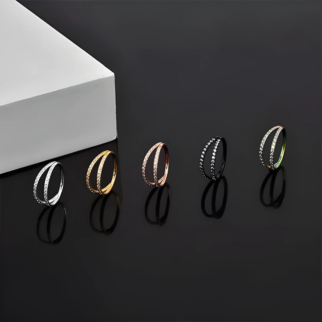 G23 titanium alloy lip and nose ring piercing jewellery in gold or steel colour, showing puncture-style design.