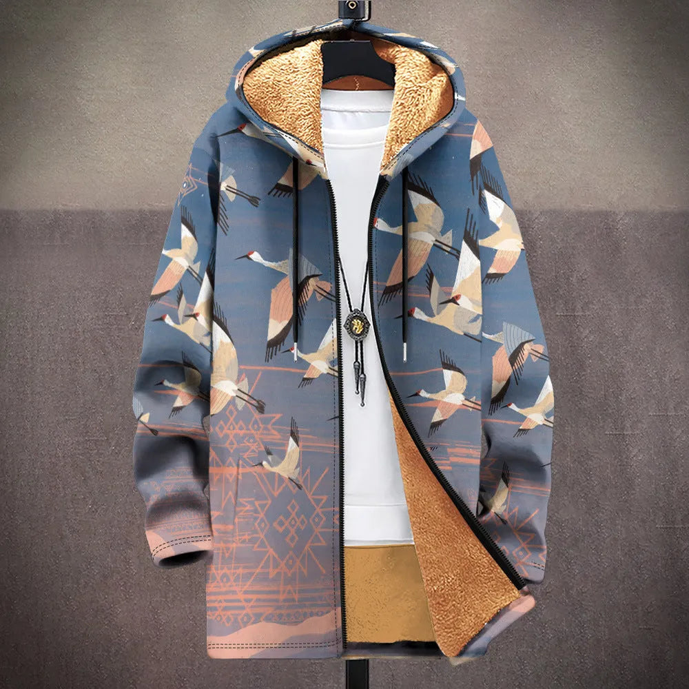 Man wearing a loose-fit zip-up hooded cardigan with a multicolour digital print pattern.