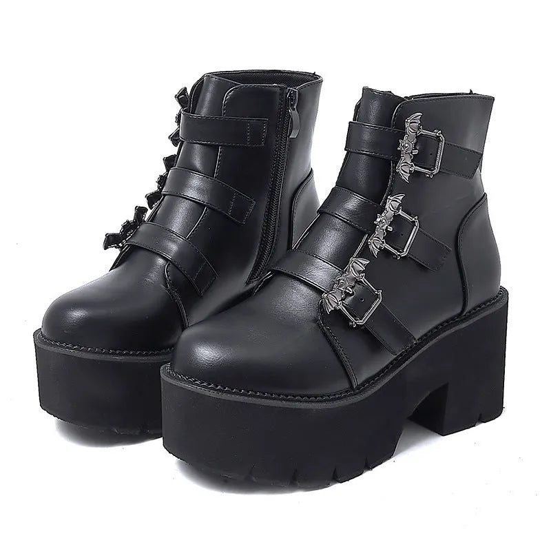 Women's black Harajuku punk ankle boots with bat buckle, side zip, and thick heel.