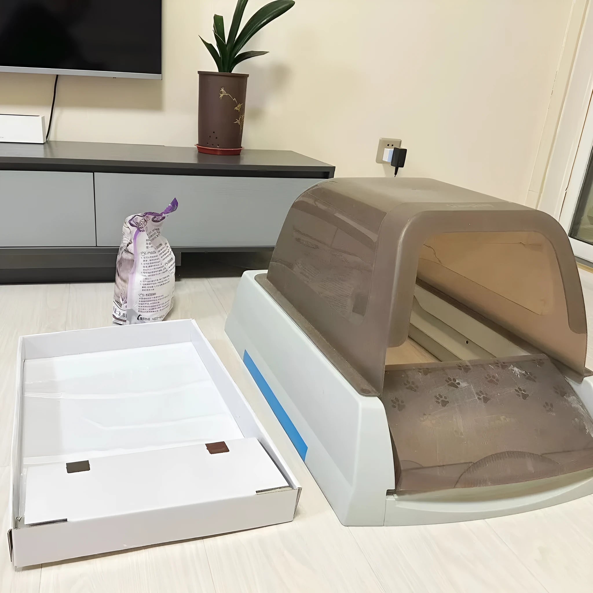 Three automatic litter box replacement trays pre-filled with white crystal sand in plastic housing