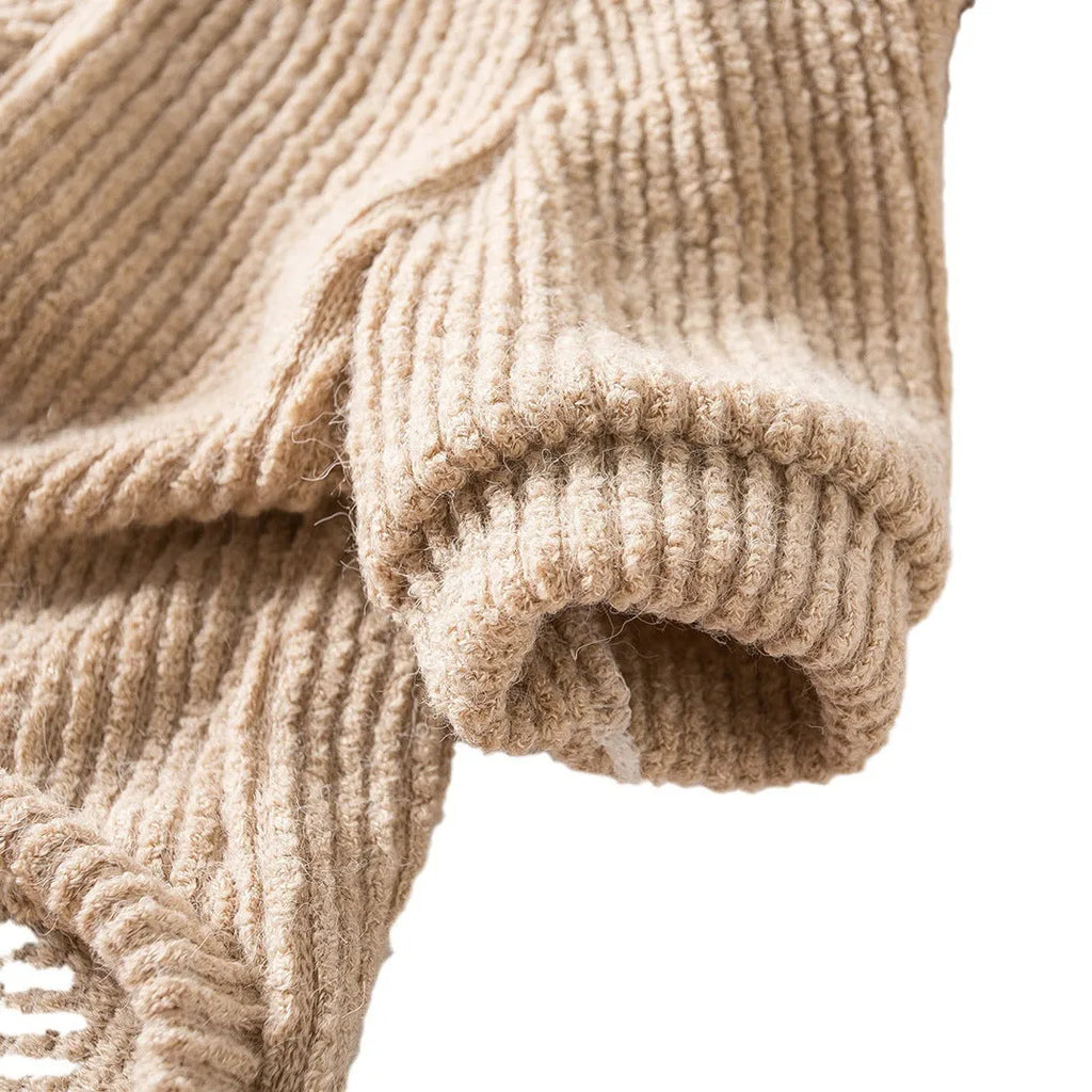 Brown cloth pullover sweater for small breed dogs on a Bichon Frise