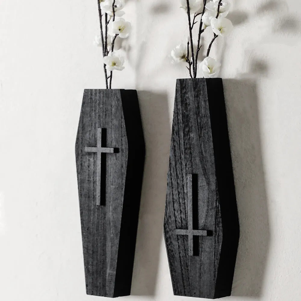 Black cross-shaped wooden wall vase shelf for decorative display measuring 27cm wide by 9cm tall