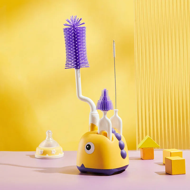 Three multifunctional cleaning brushes in a matching base, amber yellow colour, with PP handles and silicone bristles